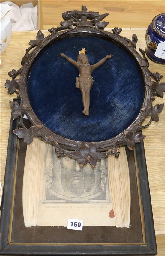 A carved framed figure of christ and a printed panel 34 x 27cm